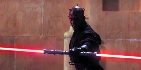An image of Darth Maul from the Star Wars universe wielding a two-sided lightsaber.